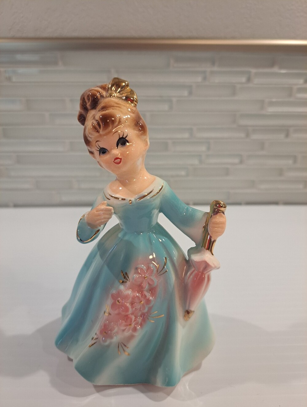 Lefton Girl Figurine. A Colorful Blue Girl Holding An Umbrella & Flowers